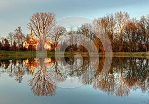 Church with reflection in pond, Cifer