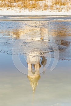 The church reflection in the river