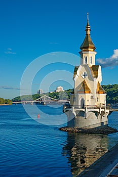 Church on river Dnipro and view of Kyiv