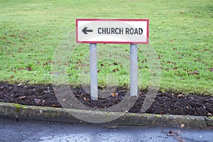 Church Road Sign Leading To Church For Religious Worship