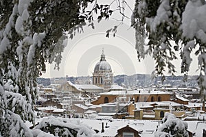 Church of Rome under snowfall