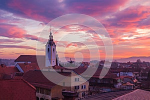 Church and roofs at sunset.