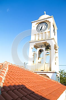 Church`s clock tower from a Greek island