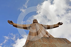The rooftop sculpture of Jesus, Church of the Sacred Heart of Jesus, Mount Tibidabo, Barcelona, Catalonia, Spain photo