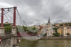 Church of Saint Georges and footbridge, Lyon, France. horizontal view of Lyon and Saone River in France