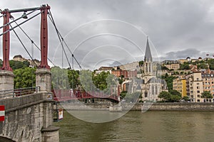 Church of Saint Georges and footbridge, Lyon, France. horizontal view of Lyon and Saone River in France