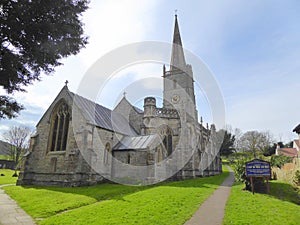 Church with steeple and churchyard