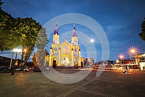 Church of San Francisco and Plaza de Armas Square at night - Castro, Chiloe Island, Chile photo