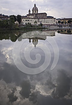 Church San Frediano Florence reflection on the river