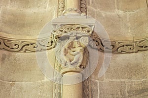 Church of San Juan de Amandi, Villaviciosa, Asturias. Sandstone capital depicting two men fighting. Romanesque and pre-Romanesque