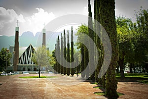 Church of San Pedro Garza surrounded by a cypress road photo