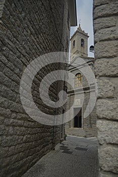 Church of San Pietro Church seen through the old walls of Tempio Pausania