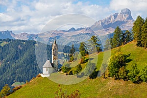 Church of Santa Barbara during the day in the cozy little village of La Valle, Alta Badia, South Tyrol