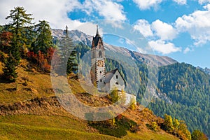 Church of Santa Barbara during the day in the cozy little village of La Valle, Alta Badia, South Tyrol