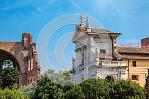 Church of Santa Francesca Romana and the Basilica of Maxentius and Constantine at the Roman Forum in rome