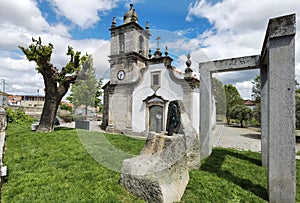 The religious monument next to the parish church photo