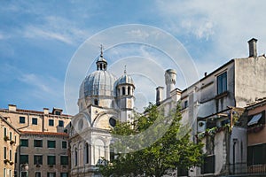 Church of Santa Maria dei Miracoli and houses in Venice, Italy