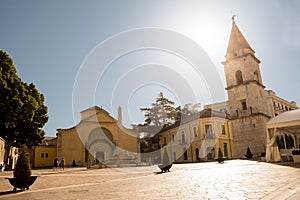 Church of Santa Sofia and its bell tower with blue sky in Benevento (Italy)