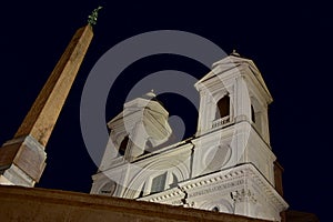 Church of the Santissima Trinita dei Monti from the Spanish Steps at night. Piazza di Spagna, Rome, Italy.