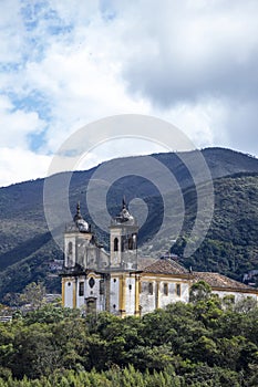 Church Sao Francisco de Paula with the mountains on background. Ouro Preto, Minas Gerais, Brazil