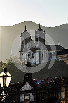 Church Sao Francisco de Paula with the mountains on background. Ouro Preto, Minas Gerais, Brazil