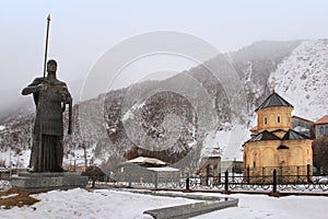 The church, Shioda Gudashauri Spiritual and Cultural Centre, the king David's statue in Sno village in winter