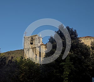 gothic revival church bell tower in spain photo