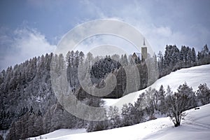 Church in snow-covered winter landscape