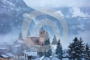 Church and snow in the old French mountain village