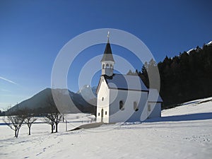 Church on snowy mountainside