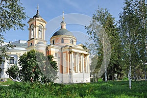 The Church of St. Barbara framed by Birch Trees