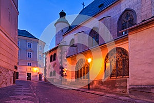 The church of St. Catherine in Banska Stiavnica town during autumn evening