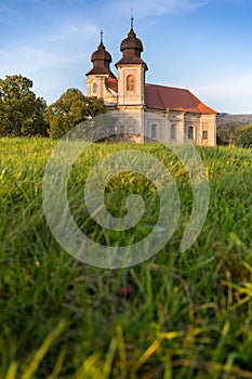 Church of St. Margaret from the 18th century near Å onov.  Beautiful church chapel in middle of fields in czech countryside