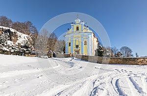 Church of St. Peter and Paul Horni Prysk in sunny winter day. Czech Republic