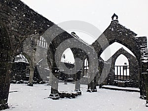 Church of st thomas a becket in heptonstall in falling snow