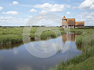 The church of St Thomas Ã  Becket reflected in a canal