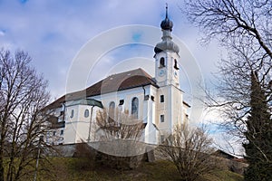 Church standing on a hill at lake Chiemsee in Bavaria
