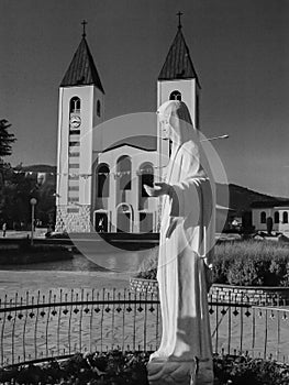 Church and statue of Madonna in Medjugorje, a place of pilgrimage from all over the world