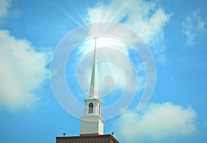 Church steeple in clouds