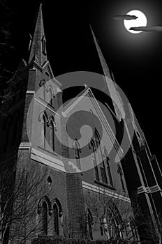 Church Steeples During Full Moon on a Dark Night photo