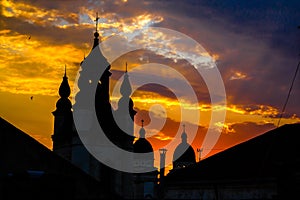 Church in a sunset beams in Lviv, Ukraine. Sunshine church contour photo