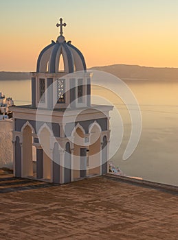 Church at sunset over Caldera, Santorini, Greece