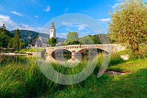 Church of Sv. John the Baptist and a bridge by the Bohinj lake