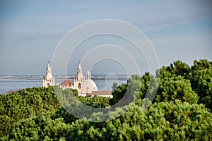 Church top in front of a river