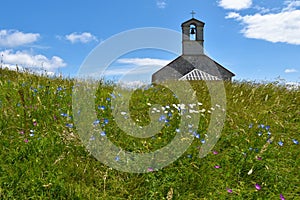 Church at the top of Sveta Trojica in Notranjska, Slovenia