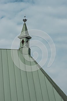 Church tower against blue sky.