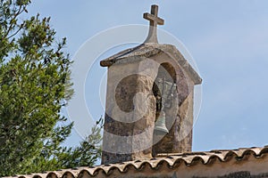 Church tower with bell in Spanish style