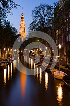 Church tower and canal in Amsterdam