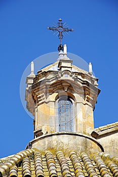 Church tower with cross, Campillos, Andalusia. photo
