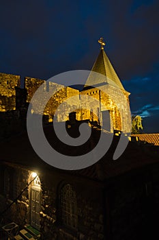 Church tower inside Kalemegdan fortress walls at night in Belgrade